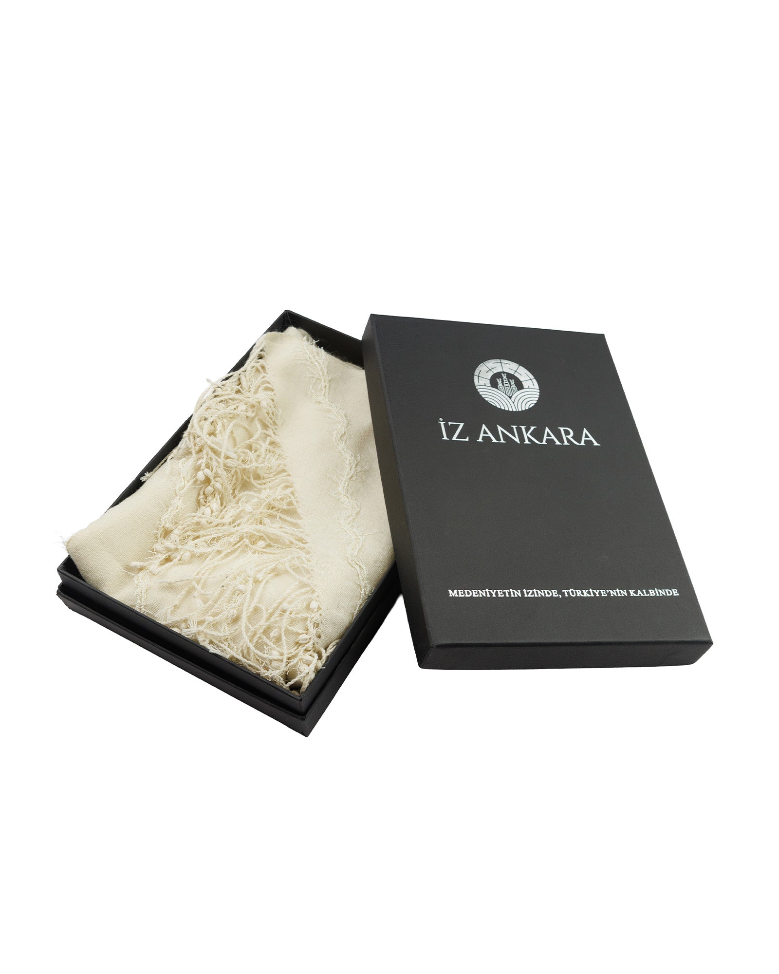 Black box with a white lace item inside, branded 'IZ ANKARA'.