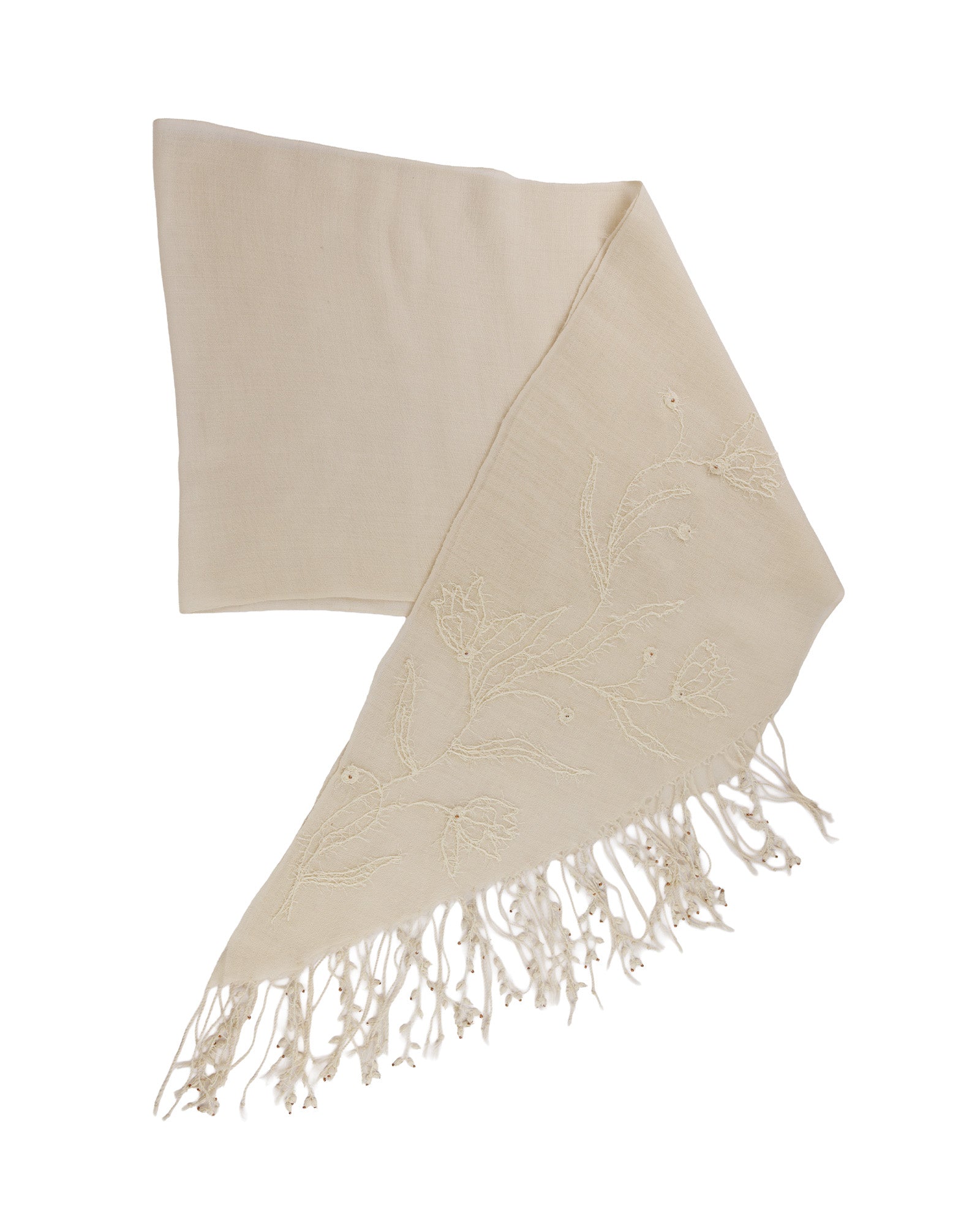 Beige scarf with tassels on a white background