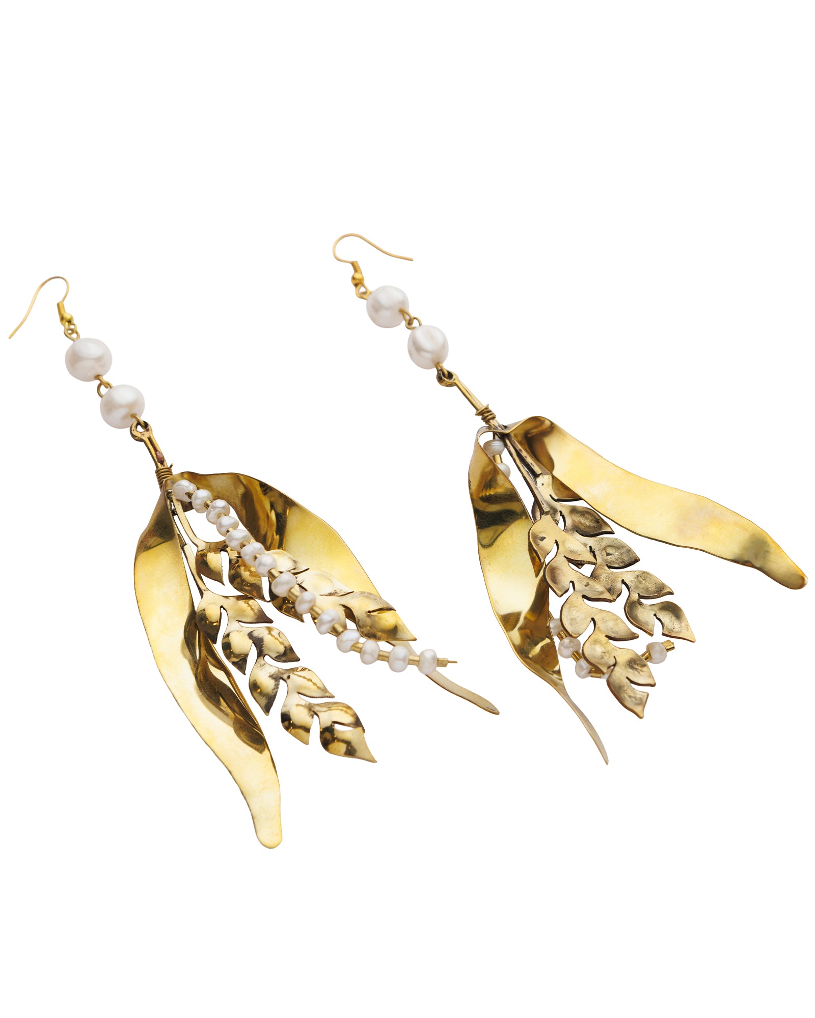 Gold leaf-shaped earrings with pearl-like beads on a white background